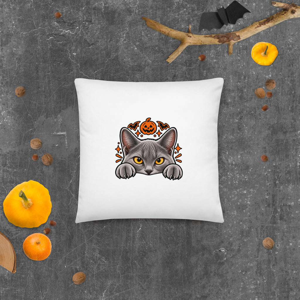 Back of the Uno the Cat Halloween pillow featuring a gray cat peeking over an edge with orange eyes, a jack-o’-lantern, bats, and spooky accents.