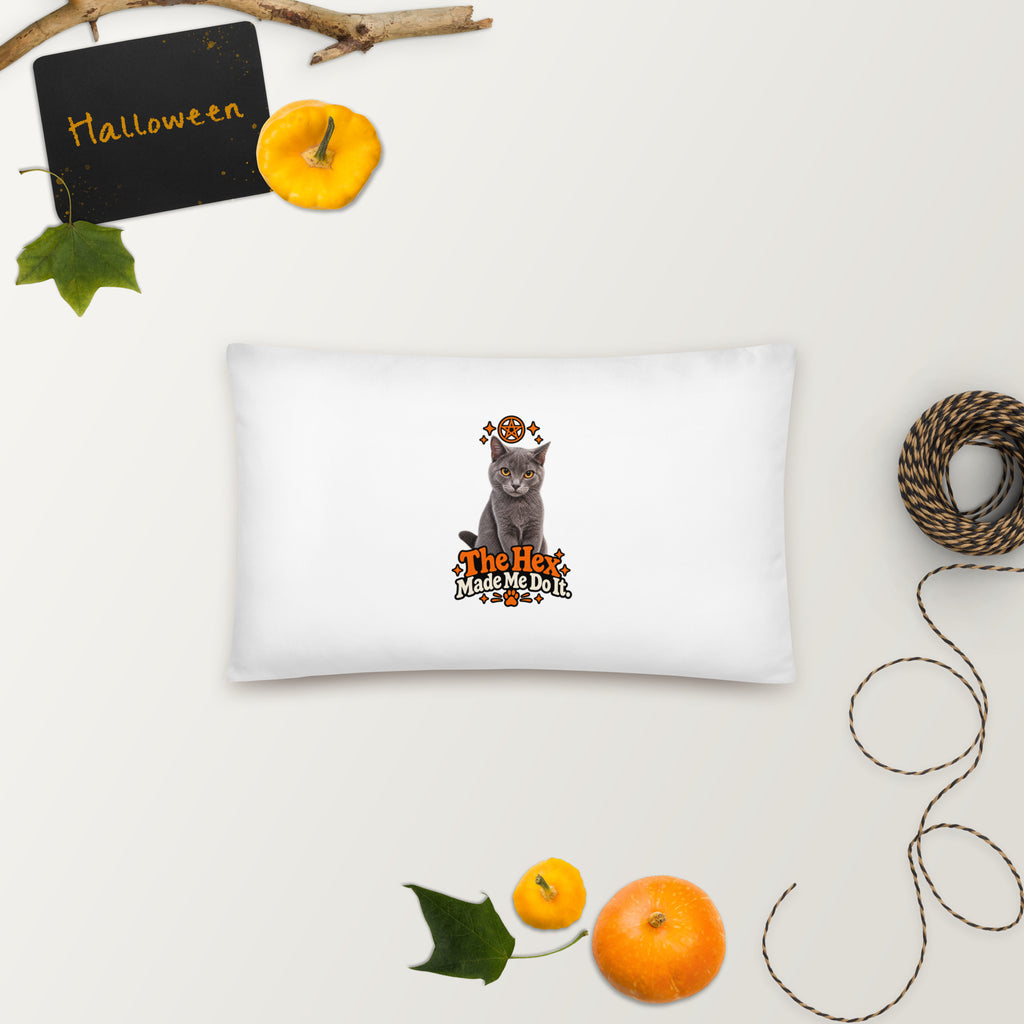 Rectangular white Halloween cat pillow featuring Uno, orange mystical artwork, and “The Hex Made Me Do It” slogan, styled with autumn decorations.