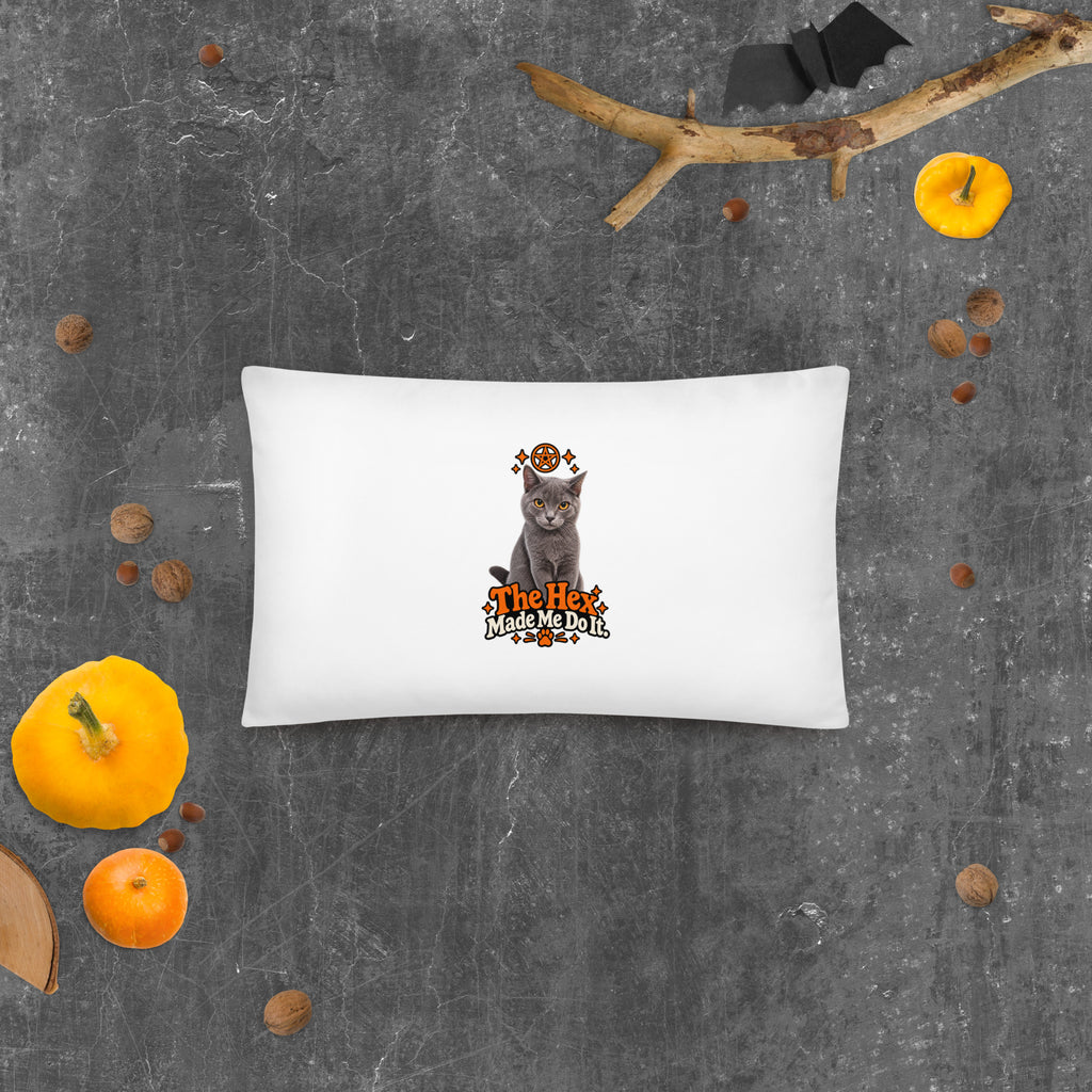 Rectangular Uno the Cat Halloween throw pillow with a gray cat and orange slogan design, displayed on a dark textured surface with pumpkins.