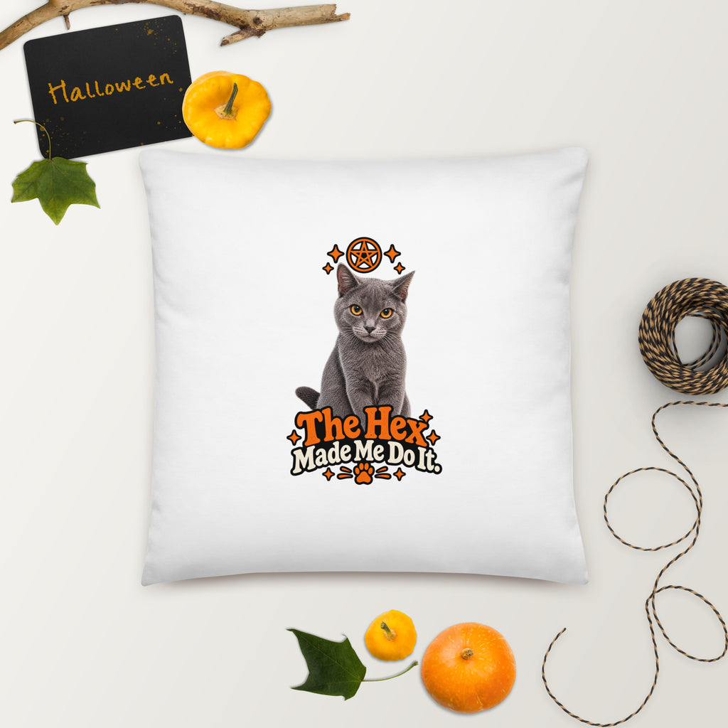 Large square Uno the Cat Halloween pillow featuring a gray cat, orange pentagram, decorative stars, paw print, and “The Hex Made Me Do It” slogan.