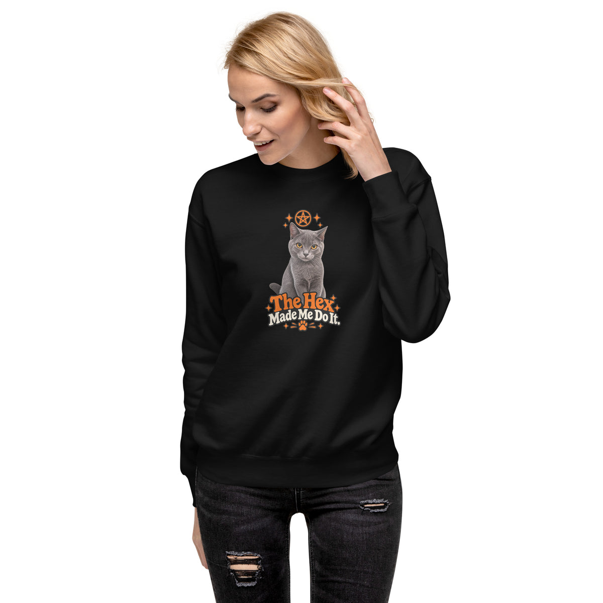 Black Uno the Cat Halloween sweatshirt with orange and white “The Hex Made Me Do It” design, shown from an angled front view.