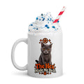 Uno the Cat Halloween coffee mug with a gray cat, orange pentagram and stars, paw print, and “The Hex Made Me Do It” slogan, shown with the handle on the left.