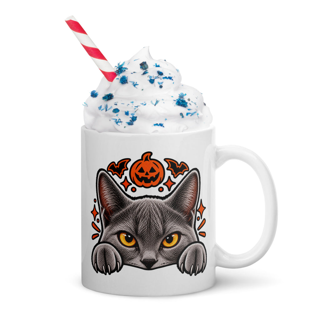 White Halloween cat coffee mug featuring a close-up of Uno peeking over the edge beneath an orange jack-o’-lantern and bats, shown with the handle on the right.